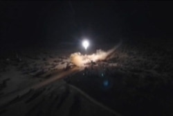 An image grab from video obtained from the state-run Iran Press news agency allegedly shows rockets launched by Iran against U.S. military bases in in Iraq, Jan. 8, 2020.