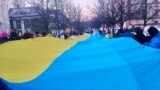 На акции протеста в Вильнюсе в третью годовщину войны России против Украины. 24 февраля 2025.