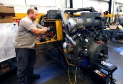 The decline in manufacturing jobs has hit men and women without a college degree the hardest. File photo from Sept. 18, 2019, at the Puckett Machinery Company in Flowood, Miss.