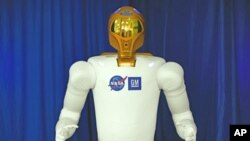 A photo of the first human-like robot - Robonaut 2, or R2 - on the International Space Station to make its operational debut on the orbiting lab.