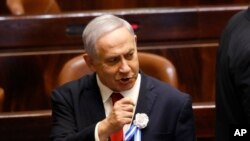 FILE - Israeli Prime Minister Benjamin Netanyahu attends the swearing-in of the new Israel's parliament in Jerusalem, Oct. 3, 2019.