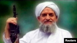 FILE - A photo of al-Qaida's leader, Ayman al-Zawahiri, is seen in this still image taken from a video released in September 2011.