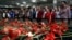 Family members, colleagues and friends of the victims of Tuesday's blasts gather for a memorial ceremony at the Ataturk airport in Istanbul, June 30, 2016.