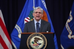 FILE - U.S. Attorney General Merrick Garland speaks at the Justice Department in Washington, June 11, 2021.