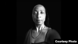 Dr. Christine Uwimana learned her biological father’s identity, and got more details about her biological mother, with help from a VOA Central Africa radio series. (Courtesy photo)