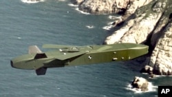 FILE - In this photo provided by the South Korea Defense Ministry, a Taurus missile flies during a drill in South Korea on Sept. 13, 2017. The Taurus missile was one subject in a phone call among senior German military officials that Russia obtained a recording of last week.