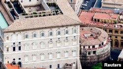 The two Italian journalists who published books last week detailing corruption and uncontrolled spending by the Vatican have been placed under investigation. The Vatican bank, previously called the institute for Works of Religion, is shown circa 2011.