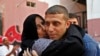 Released Palestinian prisoner Nehad Jondiya hugs his sister, after 24 years spent in an Israeli jail, at his family house in Gaza City, Aug 14, 2013. 