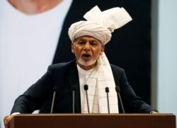 FILE - Afghanistan's President Ashraf Ghani speaks during a consultative grand assembly, known as Loya Jirga, in Kabul, April 29, 2019.