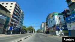 Empty streets and closed businesses are seen as locals stage a 'silent strike' in Yangon, Myanmar, Dec. 10, 2021, in this image obtained by Reuters.