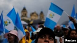Demonstrators take part in a protest against Guatemalan President Jimmy Morales and his decision not to renew the mandate of the CICIG, in Guatemala City, Guatemala, Sept. 1, 2018. 