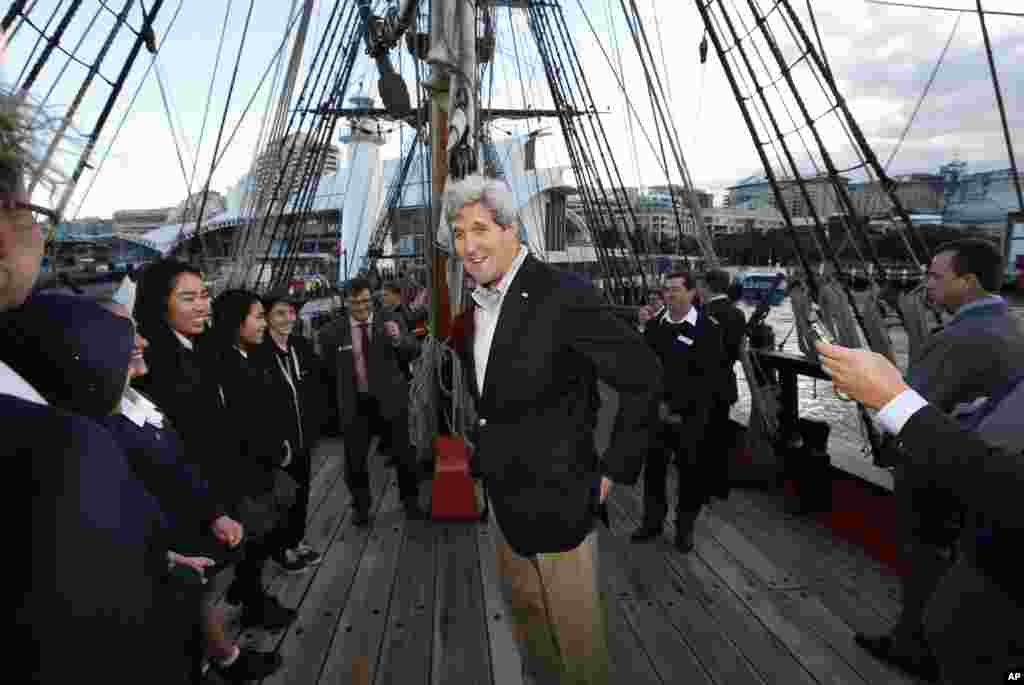 U.S. Secretary of State John Kerry meets students from several Sydney high schools during his visit aboard a replica of Captain Cook&#39;s ship &#39;Endeavour&#39; at the Australian National Maritime Museum in Sydney, Australia, Aug. 11, 2014.