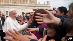 Pope Francis leaves at the Vatican, Wednesday, March 27, 2019. (AP Photo/Andrew Medichini)
