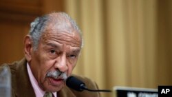 FILE- Rep. John Conyers, D-Mich., speaks during a hearing of the House Judiciary subcommittee on Capitol Hill in Washington, April 4, 2017.