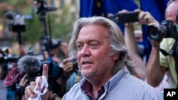 FILE - Then-President Donald Trump's former aide Steve Bannon speaks with reporters in New York City, Aug. 20, 2020. 