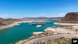FILE - Low water levels are seen at Elephant Butte Reservoir near Truth or Consequences, NM, on July 10, 2021.