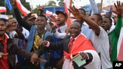 FILE - Congo opposition party supporters demonstrate during a rally against President Joseph Kabila running for president for a fourth term in Kinshasa, DRC, Sept. 15, 2015.