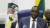 Senegal's President Macky Sall, seen in this Dec. 2015 file photo in Abuja, Nigeria, has come under pressure ahead of a constitutional referendum - set for March 20 - to limit presidential terms.