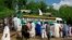 A busy day at Maiduguri's cattle market, and a truck with an apt description. (Fati Abubakar)