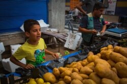 Mahmoud, 11, lost his friend 13-year-old Mohammed, after he died after being hit by shrapnel from a bomb, pictured on Oct. 18, 2019 in Qameshli, Syria. (Y. Boechat/VOA)