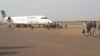 Passengers disembark at Juba International Airport, which is to undergo an overhaul funded by China's Export and Import Bank.