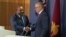 Australian Prime Minister Anthony Albanese, right, shakes hands with Papua New Guinea Prime Minister James Marape at a press conference in Sydney, Australia, Dec. 12, 2024. 