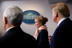 President Donald Trump and Vice President Mike Pence listen as Dr. Deborah Birx, White House coronavirus response coordinator, speaks about the coronavirus in the James Brady Press Briefing Room of the White House, April 23, 2020.