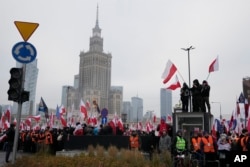 People take part in Independence Day march organized by far-right groups in Warsaw, Poland, Nov. 11, 2024.