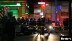 La police sur le lieu de la fusillade à Toronto, au Canada, le 22 juillet 2018. REUTERS / Chris Helgren 
