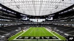 The Las Vegas Raiders kick off to the New Orleans Saints to start an NFL football game, Monday, Sept. 21, 2020, in Las Vegas. (AP Photo/Isaac Brekken)
