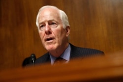 FILE - Senate Majority Whip Sen. John Cornyn, R-Texas, speaks during a hearing on Capitol Hill in Washington, May 8, 2019.