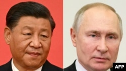 FILE - This combination of pictures shows China's President Xi Jinping and Russian President Vladimir Putin. Xi and Putin "held a video meeting at Beijing's Great Hall of the People on Jan. 21, 2025," state broadcaster CCTV said.