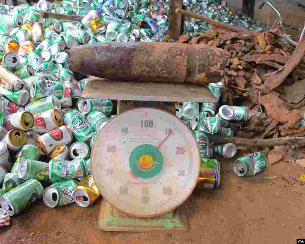 Bomb on scales at scrap yard. (VOA/M. Brown) 