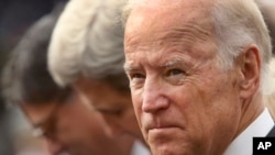 FILE - From right to left, Vice President Joe Biden, Secretary of State John Kerry and Treasury Secretary Jacob Lew.