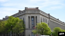 FILE - The Department of Justice in Washington, DC, on April 16, 2019. A former US Army sergeant was arrested on Oct. 6, 2023, and accused of seeking to provide classified information to China, the Justice Department said.