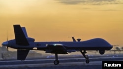 FILE - A MQ-9 Reaper drone taxis at Kandahar Airfield, Afghanistan in this Dec. 27, 2009 photo. 