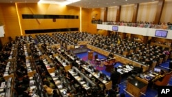 File - f Members of Parliament at Parliament house in Kuala Lumpur, Malaysia, Monday, June 24, 2013