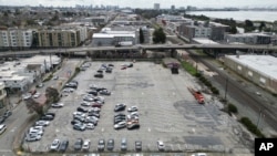 An aerial view shows a parking lot that was once the Shellmound village site in Berkeley, Calif., March 12, 2024.