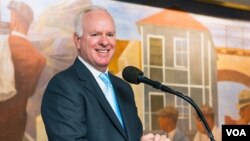 FILE - The U.S. Agency for Global Media’s former Chief Executive John Lansing is photographed preparing to speak in this undated photo taken at USAGM's headquarters in Washington. He died Wednesday in Wisconsin at age 67.
