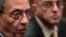 Amr Moussa (L), chairman of the committee to amend the country's constitution speaks at a news conference, next to media spokesperson Mohamed Salmawy, at the Shura Council in Cairo, Sept. 22, 2013.