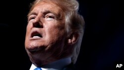 President Donald Trump speaks at the Veteran's of Foreign Wars national convention, July 24, 2018, in Kansas City, Mo.