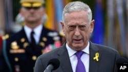 FILE - Defense Secretary Jim Mattis speaks at the Pentagon in Washington, Sept. 21, 2018.