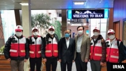 Chinese medical workers arrive at Tehran airport, Feb. 29, 2020, to help Iran with its coronavirus response. (IRNA photo)