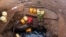 FILE - A woman fetches water from a well near Marsabit in northern Kenya, Sept. 16, 2014. A Kenyan university student from Marsabit County has won a grant to help track expectant mothers in the area.
