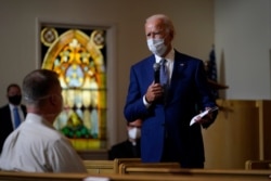 Democratic presidential candidate Joe Biden speaks as he meets with members of the community at Grace Lutheran Church in Kenosha, Wis., Sept. 3, 2020.