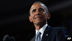 FILE - President Barack Obama pauses as he speaks during 2016 Democratic National Convention in Philadelphia, July 27, 2016. 
