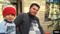 Nathir Bashir, 36, was forced to teach in an IS school for two and half years, but he kept his four children at home, away from IS ideology, in Mosul, Iraq, Nov. 27, 2016. (H. Murdock/VOA)