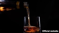 FILE - 'Having children in the home was associated with more drinking,' an expert said.