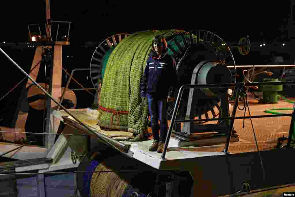 Raquel Gomez Delgado, 43, a marine fishing inspector, poses on board a fishing boat at Punta del Moral port in Huelva, Spain, Feb. 22, 2017. &quot;In my opinion the only way to end gender inequality is through education in schools and bringing us examples of equality [in the media],&quot; Delgado said.