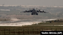 FILE - A U.S. Air Force plane takes off from the Incirlik airbase, southern Turkey. 